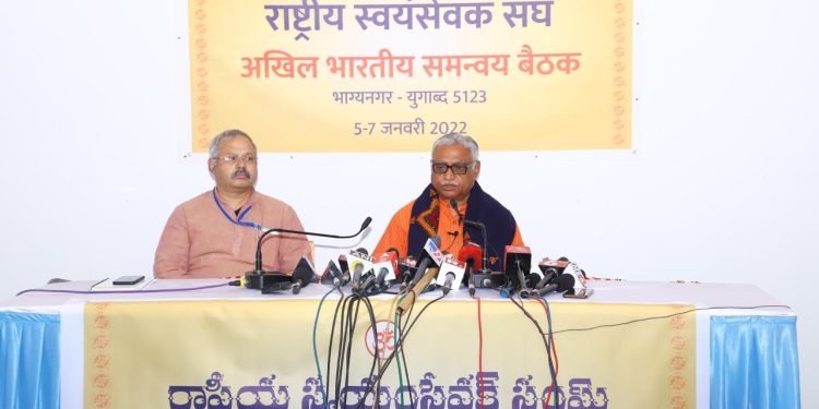 Photo caption: RSS sahsarkaryah Manmohan Vaidya addressing a press conference at Hyderabad on January 7. Sunil Ambedkar is also seen