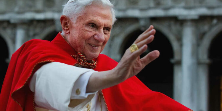 VENICE, ITALY - MAY 07:  Pope Benedict XVI greets the crowd gathered in St Mark's Square while crossing the square on an electric car on May 7, 2011 in Venice, Italy. Pope Benedict XVI is visiting Venice until May 8, some 26 years after his predecessor Pope John Paul II last visited the city.  (Photo by Marco Secchi/Getty Images)